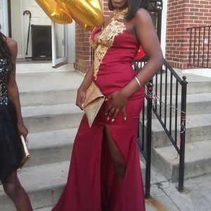 This is a very pretty elegant burgundy dress